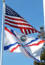 American Assyrian Flags over the blue sky of San Jose California