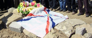 Assyrian flag over the grave of a martyr in Ashur