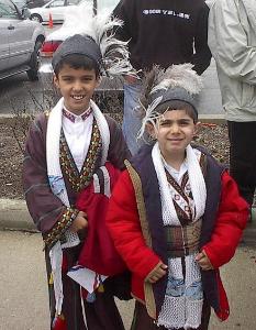 Assyrian boys in traditional Ashuria clothing