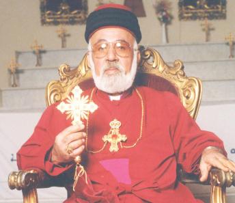 Assyrian Cross hald by Mar Addai