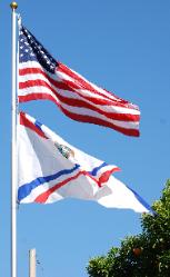 American Assyrian Flags over the blue sky of San Jose California