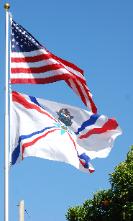 American Assyrian Flags over the blue sky of San Jose California