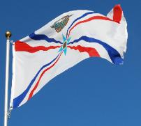 Assyrian Flag over the blue sky of San Jose California, By An Ashuria